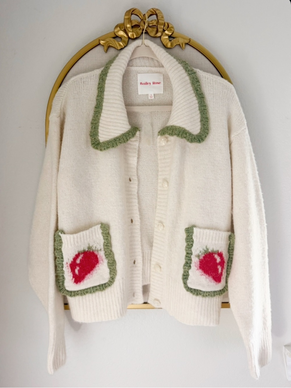 Bailey Rose Cream Cardigan with Green Trim and Strawberry Accent Pockets